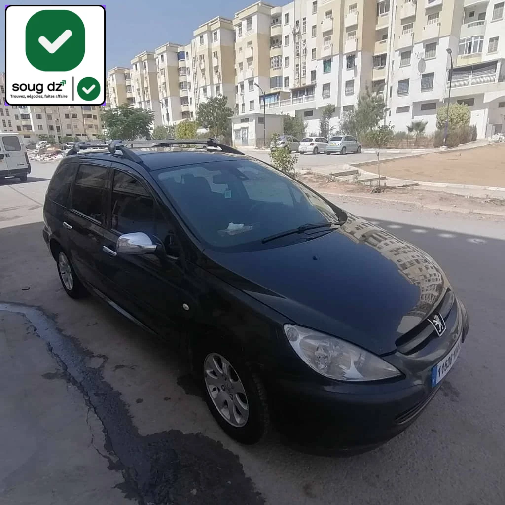 Peugeot 307 sw la XT 90 ch HDI moteur ma7tot kolchi fiha d'origine kolchi march la toutes la tolle fiha lik avant coté droite